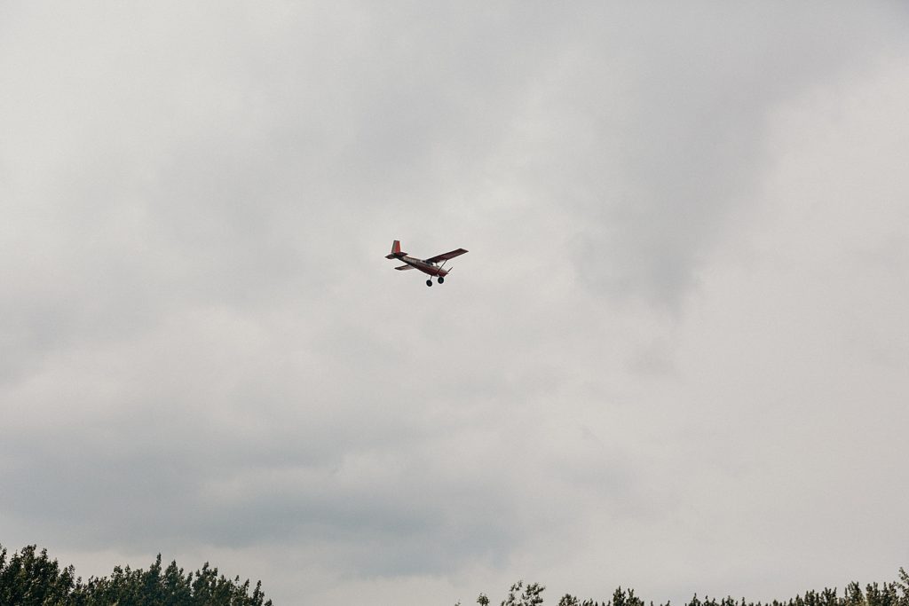 Classic airplane flying in the sky