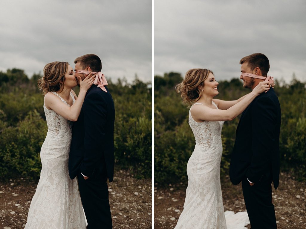 Bride kissing blindfolded Groom