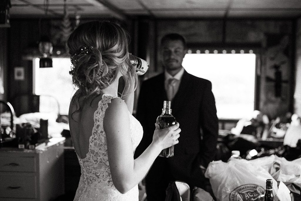 B&W Bride and Groom having a drink together