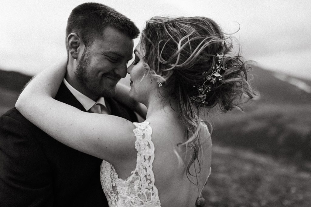 B&W Bride and Groom holding each other close