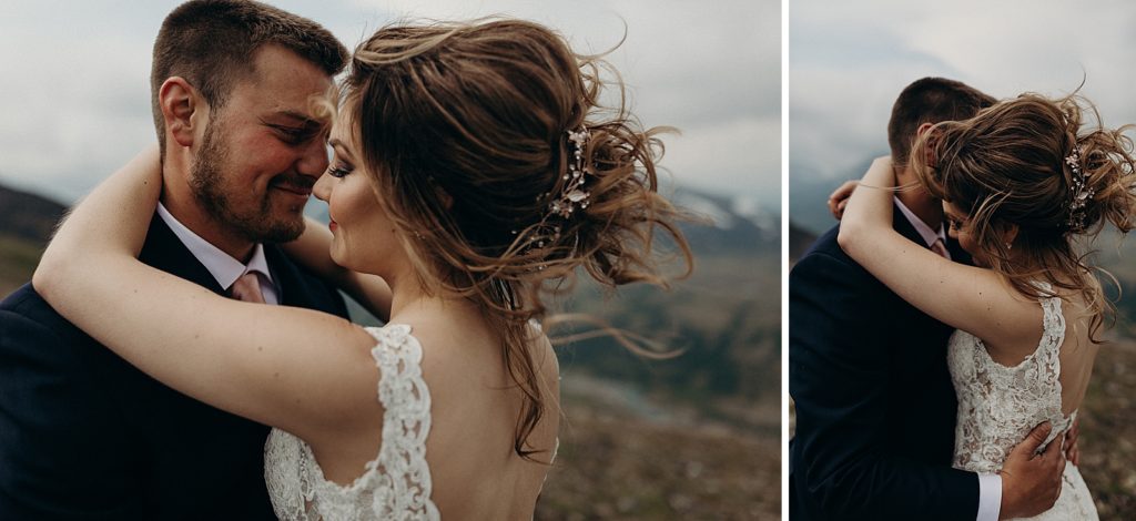 Bride and Groom hugging each other on the mountain