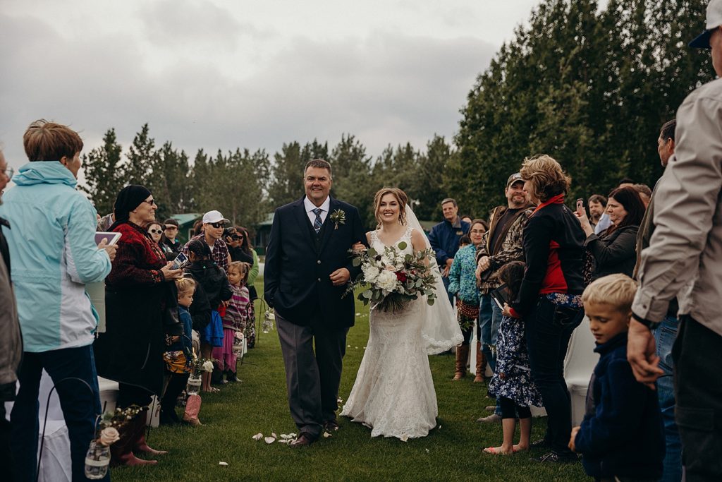 Bride and Father arm in arm entering Ceremony