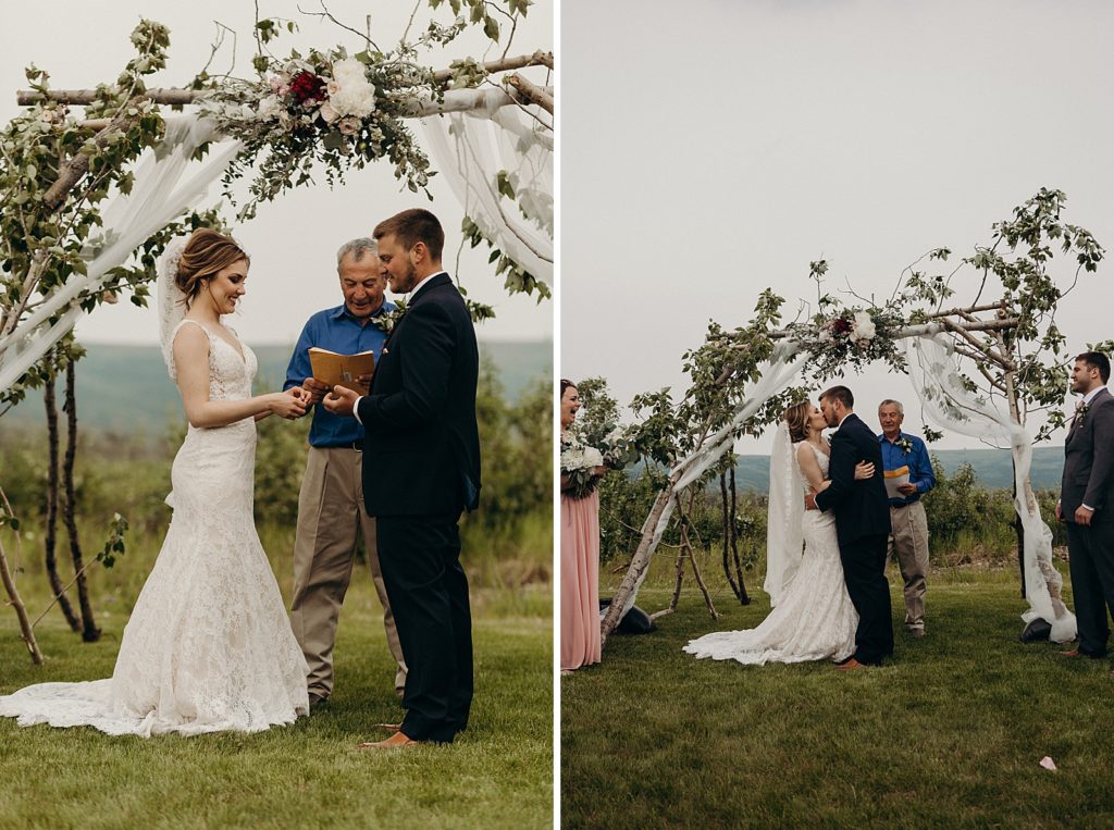 Just married Bride and Groom kissing at Ceremony