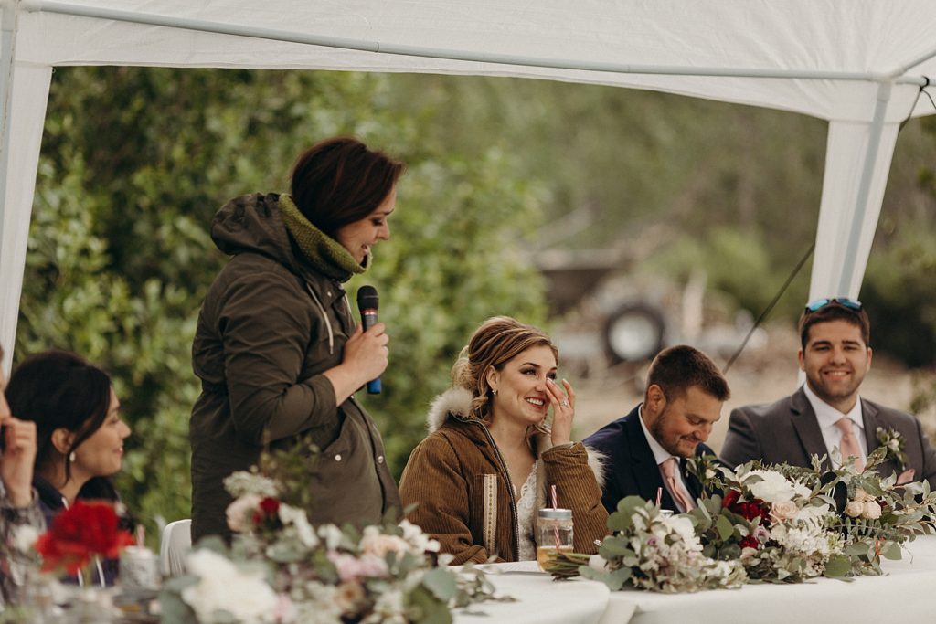 Maid of honor speech at wedding table